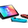 Nintendo Switch (OLED) - Neon - Console - immagine 4